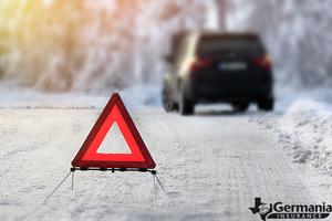 An emergency triangle from a winter roadside emergency kit