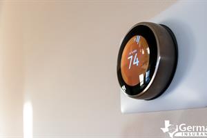 A Nest smart thermostat.