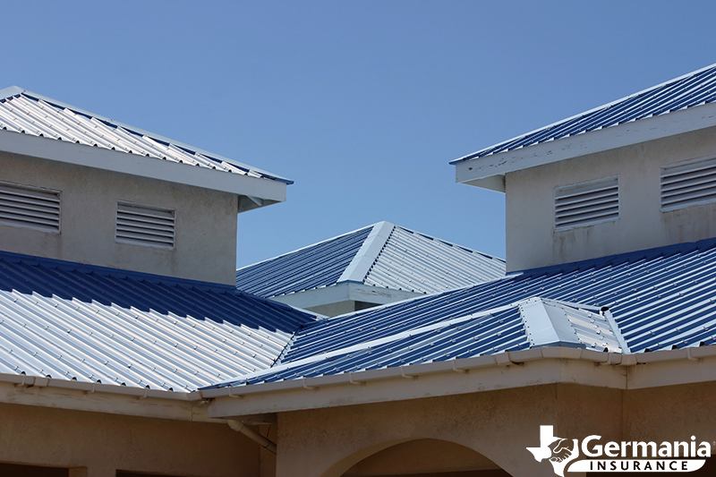 Sheet metal roof, demonstrating the different types of roof shingles.