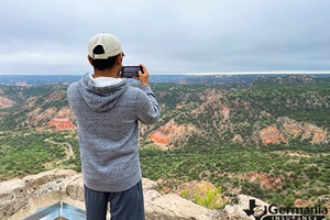 Man taking instagram photo at Palo Duro Canyon in Texas