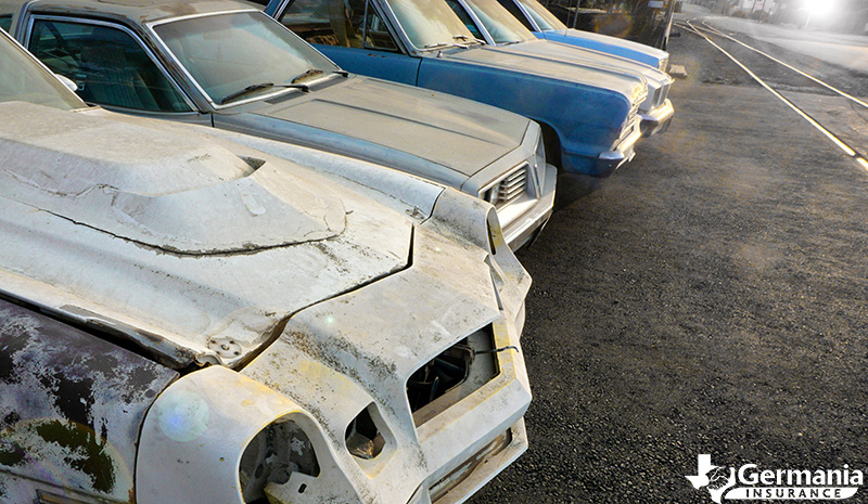 A lot of cars in a salvage lot