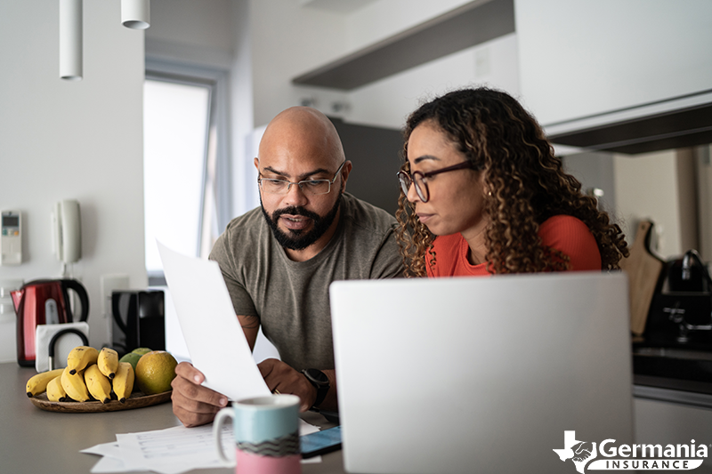 A couple discussing increased homeowners insurance cost